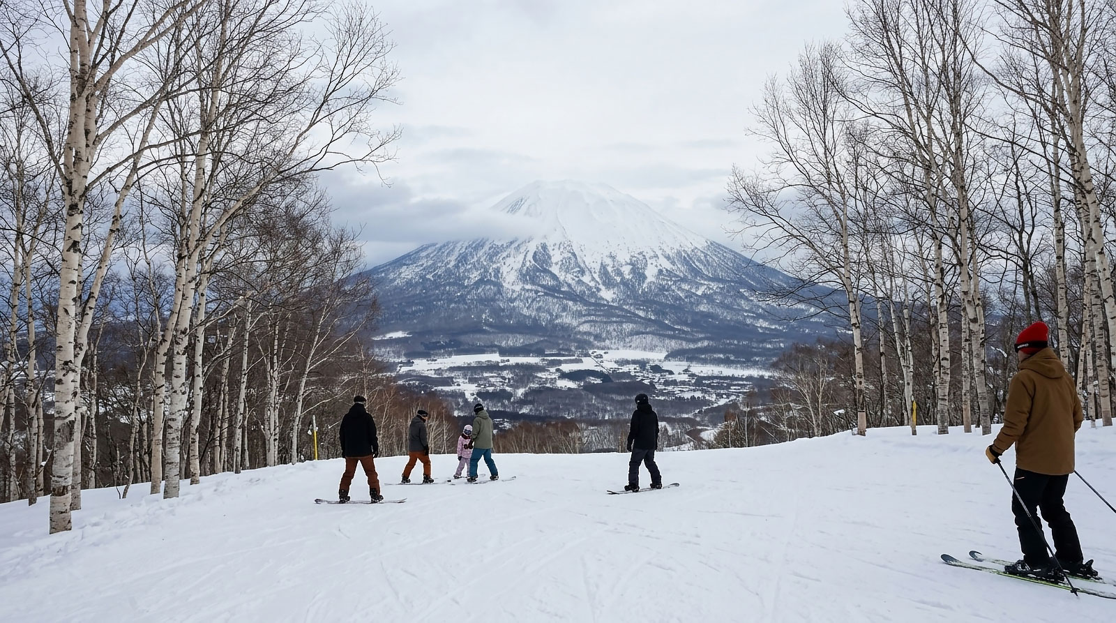 Hokkaido, Japan. Skiers and snowboarders on the mountain.